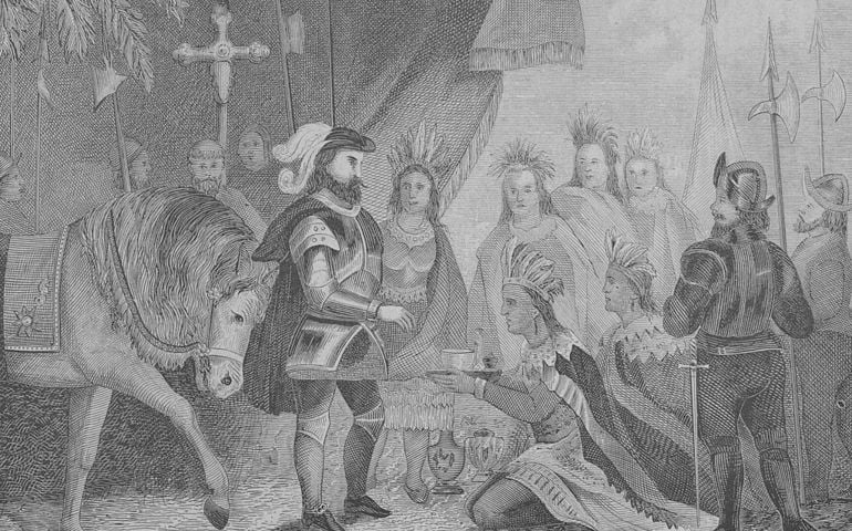 An engraved portrait of Spanish conquistador Hernando Cortez, (1485-1547), receiving Montezuma's presents, circa 1518.
