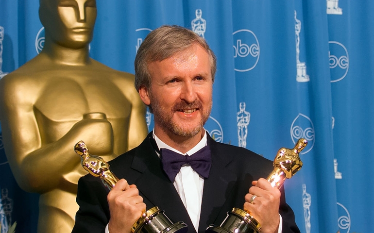 LOS ANGELES, CALIFORNIA - MARCH 23: Winner James Cameron holds his Oscar Awards backstage at Academy Awards Show, March 23, 1998 in Los Angeles, California