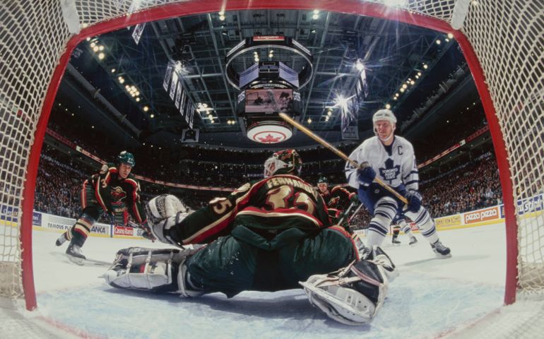 Manny Fernandez #35, Goalkeeper for the Minnesota Wild saves the shot from #13 Mats Sundin, Captain and Center for the Toronto Maple Leafs during the NHL Eastern Conference Northeast Division game on 5th February 2002 at the Air Canada Centre Arena in Toronto, Canada. The Maple Leafs won the game 3 - 1.