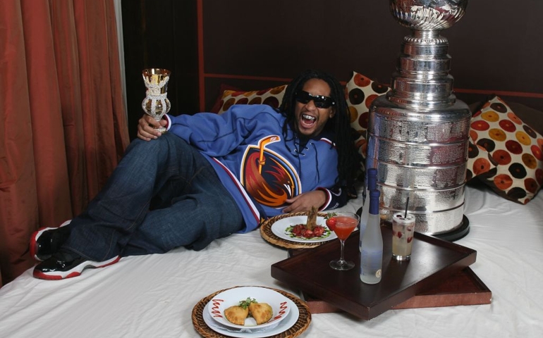 ATLANTA - APRIL 11: Rapper Lil' Jon poses with the Stanley Cup at the club b.e.d. in Atlanta April 11, 2006 in Atlanta, Georgia. The Thrashers won the game 5-2.