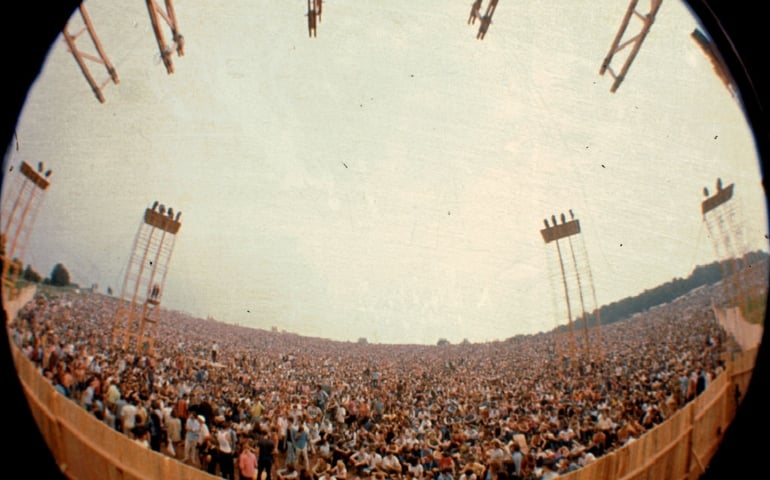 A view of the crowd at the Woodstock Music Festival taken from the main stage, Bethel, NY, August 1969.