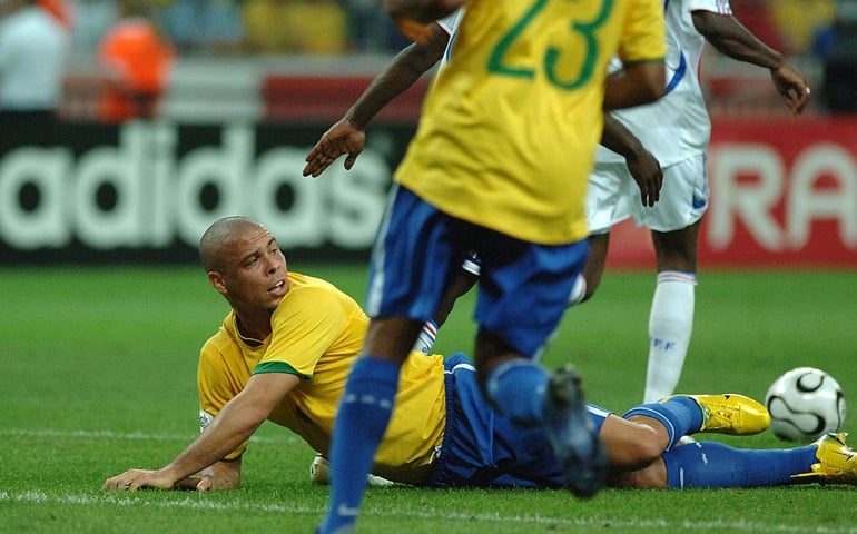 GERMANY - JULY 01: Brazilian player Ronaldo lies on the ground after falling during the 2006 FIFA World Cup Brazil versus France quarter-final soccer match, in which France beat Brazil 1-0 in Frankfurt, Germany, Saturday, July 1, 2006. (