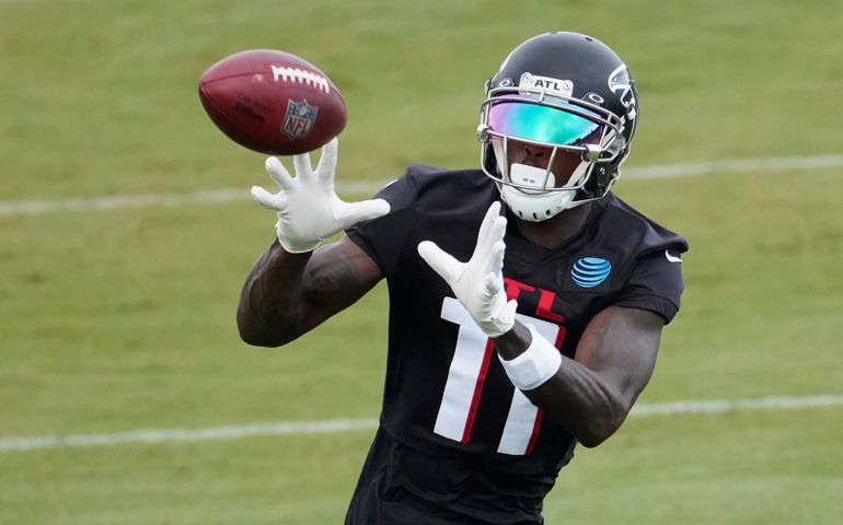 Aug 23, 2020; Atlanta, GA, USA; Atlanta Falcons wide receiver Julio Jones (11) makes a catch during an NFL training camp football practice Sunday, Aug. 23, 2020, in Atlanta.