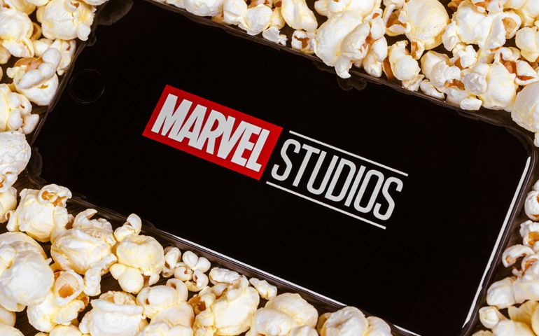 Marvel studios logo on smartphone screen