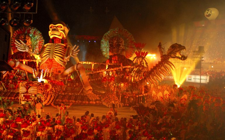 Boi Bumba, Brazil's largest folklore festival, traditional dispute between two ox group, blue and red. Stadium is filled with huge figures from Amazon myth