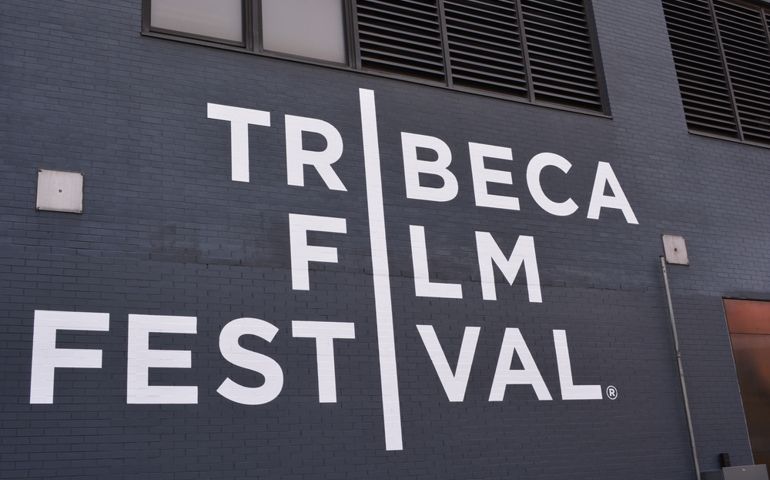 Sign painted on a building in Lower Manhattan for the annual, landmark "Tribeca Film Festival" in