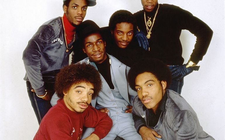Portrait of Grandmaster Flash (seated in center) and the Furious Five, New York, December 1980.