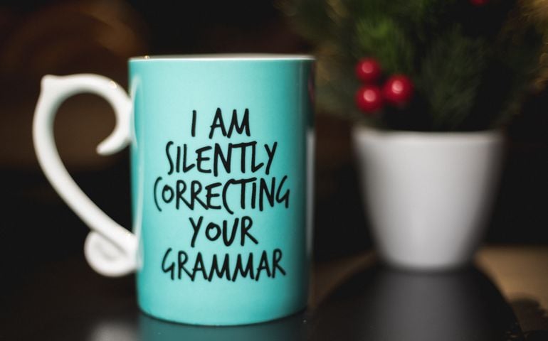 "I am silently correcting your grammar" coffee mug