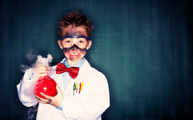 Brewing conceptual solutions to creative needs. A young scientist loves to experiment with science and chemicals.