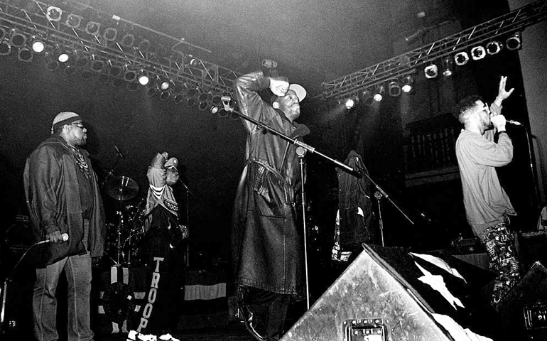 Afrika Bambaataa and Jungle Brothers] perform on stage at Dance Mandela concert at Brixton Academy, London, United Kingdom, 1990.