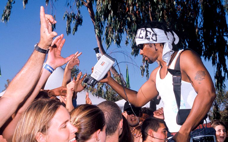 MOUNTAIN VIEW, CA - AUGUST 16: Snoop Dogg videotaping the crowd at the Smokin' Grooves Tour 1997 at Shoreline Amphitheatre on August 16, 1997 in Mountain View California.
