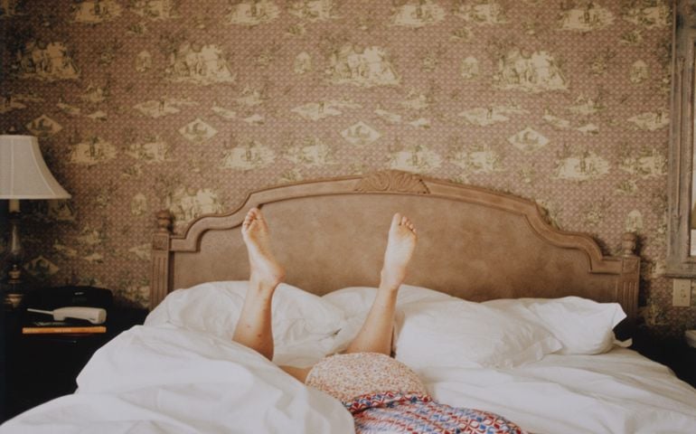 Woman Lying on Bed