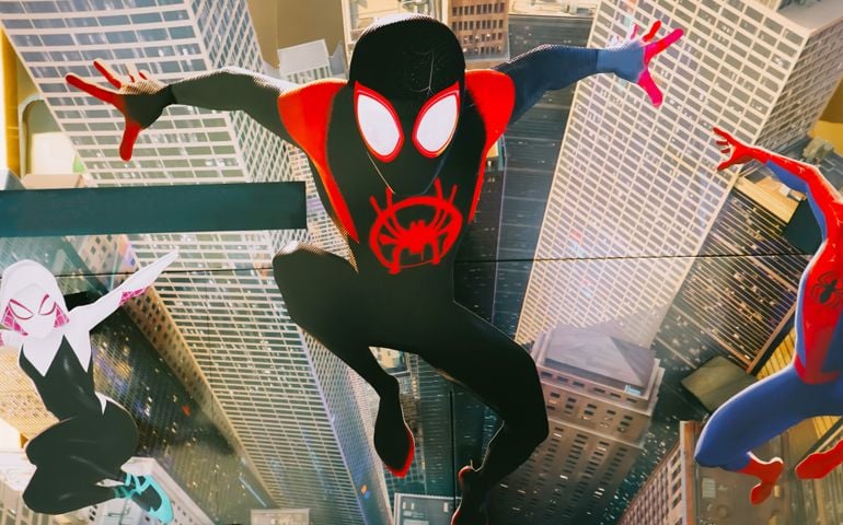 A beautiful standee of a movie called Spider-Man into the Spider-verse display at the cinema