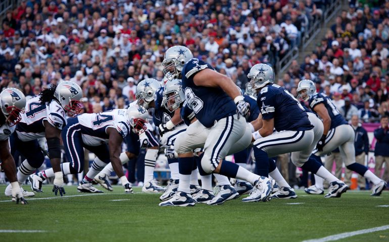 Quarterback Tony Romo, No 9 of Dallas Cowboys takes hike at Gillette Stadium, New England Patriots vs. Dallas Cowboys