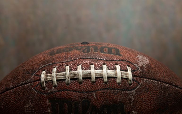 Closeup of Rugged looking Pro Football Pig Skin