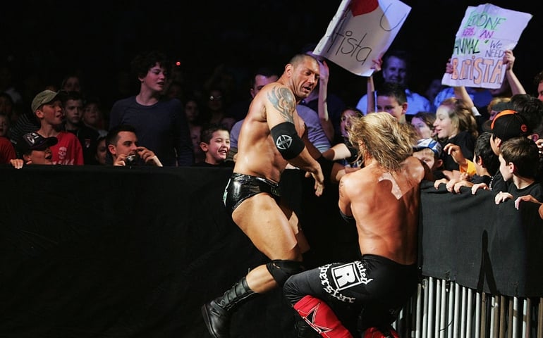 SYDNEY, AUSTRALIA - JUNE 15: Batista fights World Heavyweight Champion Edge outside the ring during WWE Smackdown at Acer Arena on June 15, 2008 in Sydney, Australia.