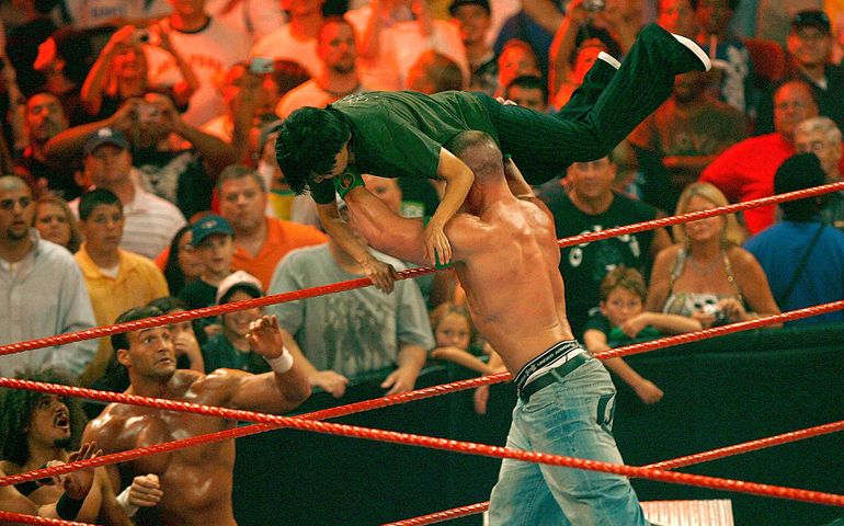 UNCASVILLE, CT - AUGUST 3: Actor Ken Jeong is thrown from the ring by John Cena during WWE's "Monday Night Raw" at Mohegan Sun on August 3, 2009 in Uncasville, Connecticut.