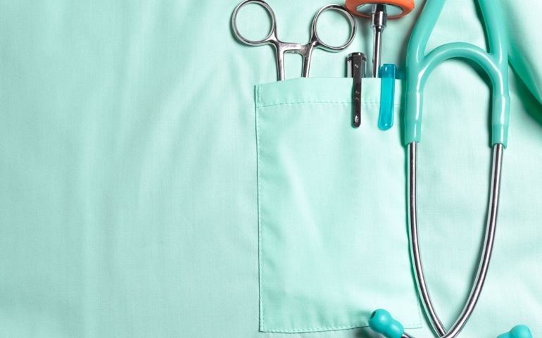 Doctors pockets with medical instruments.