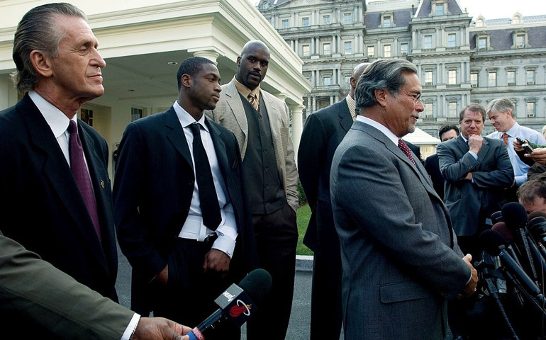 UNITED STATES - FEBRUARY 27: Appearing from left to right, Miami Heat coach Pat Riley, his team's injured guard Dwyane Wade, and center Shaquille O'Neal, join Heat owner Micky Arison, right, at a news conference on the driveway of the White House after meeting with U.S. President George W. Bush to commemorate their 2006 National Basketball Association championship win, in Washington, D.C., Tuesday, Feb., 27, 2007.