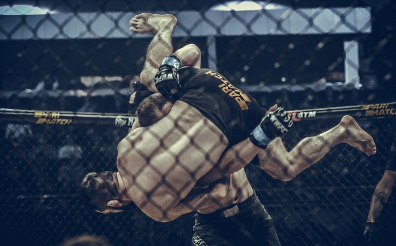 Mikhail Odintsov mma fighters fight Paata Chapelia at the ring during WWFC 14