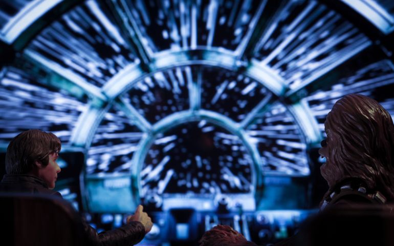 Corellian freighter Millenium Falcon travels through Hyperspace
