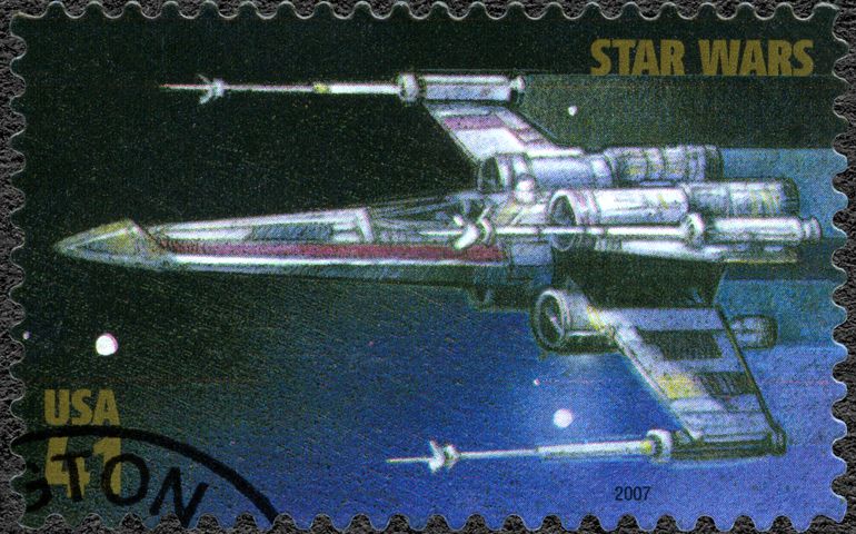 A stamp printed in USA shows X-wing Starfighter, series Premiere of Movie Star Wars 30 anniversary