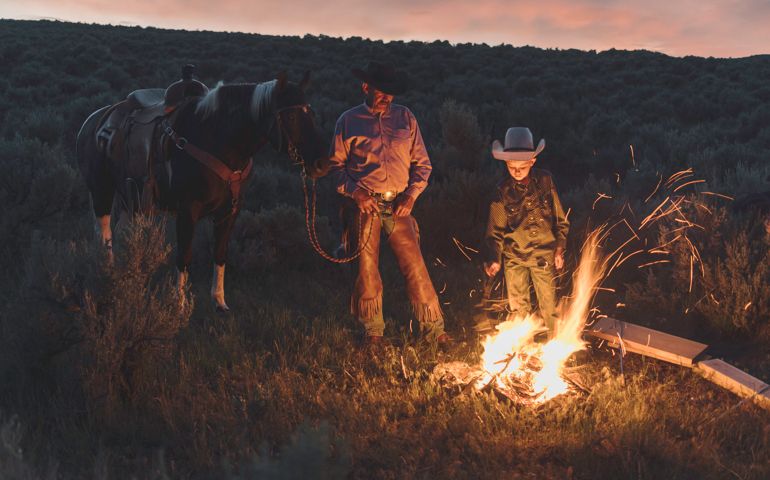 High quality stock photo of a sunset on a cowboy campfire cookout in Utah