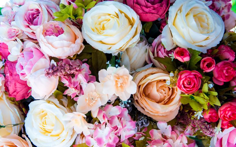 Floral background. artificial flowers in a colorful composition