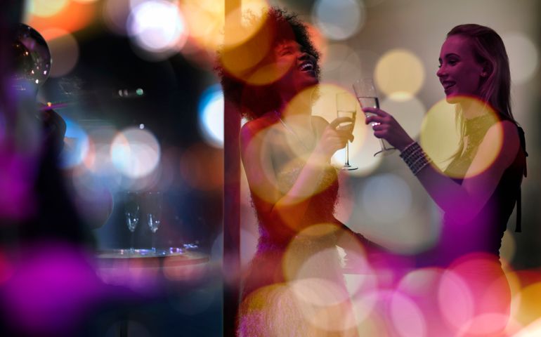 Two women having fun on a party