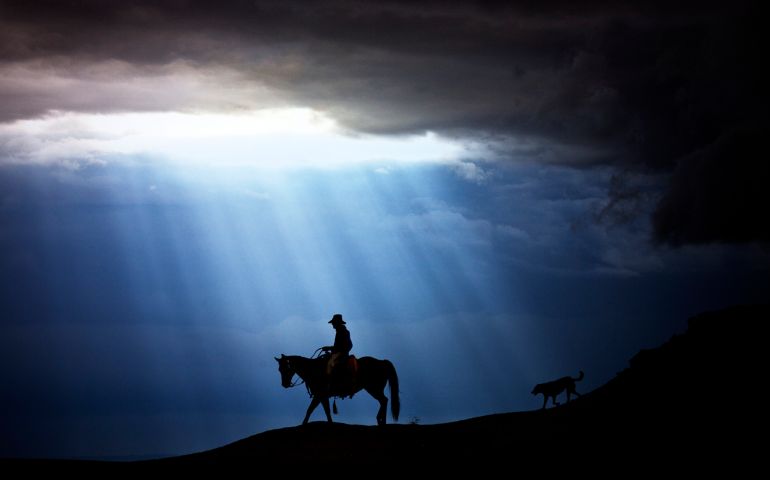 Light coming through clouds in a God Ray formation