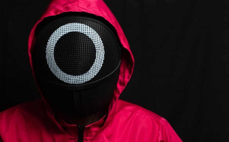 Guard from Squid Game on black background