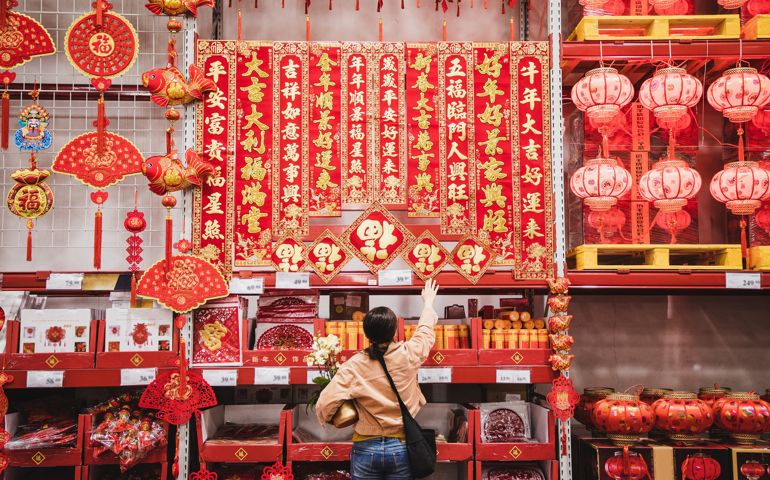 Asian woman shopping for Chinese New Year decoration