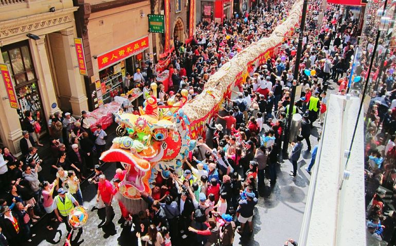 High Angle View Of Dragon Dancer On Street During Chinese New Year