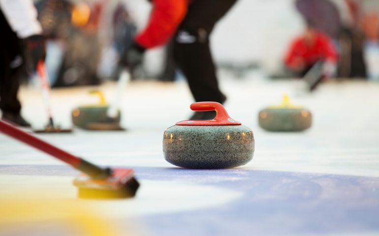 Curling stones on ice