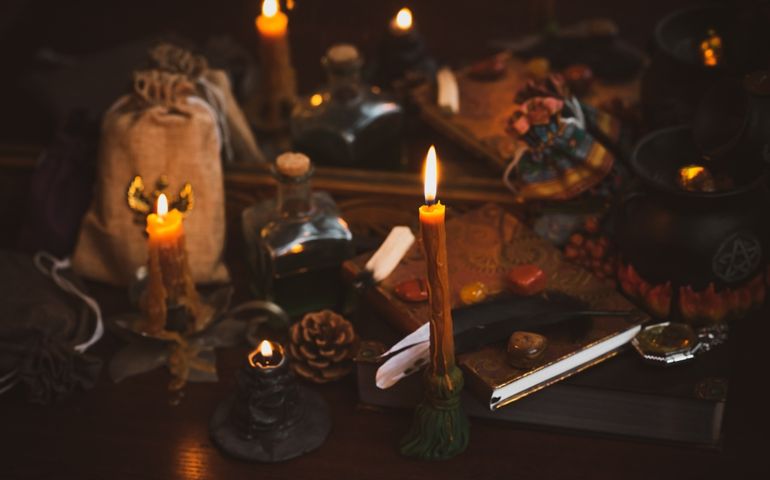 Subjects of the school of magic....candle light Scarf, magic stuff, book of spells dark background