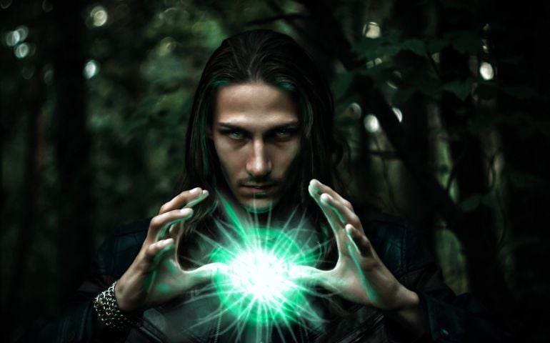 Long haired white male with a mystical glowing orb to signify power, magic, spirituality and so forth