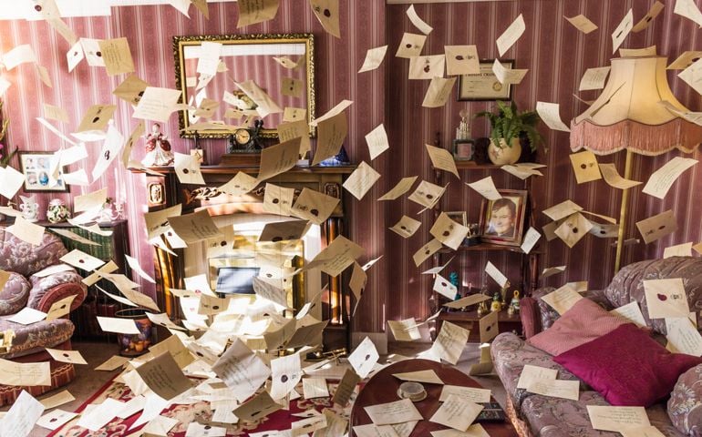 The set of the living room at 4 Privet Drive with flying letters in Warner Brothers studio and can be visited during the Making of Harry Potter tour, Leavesden, UK