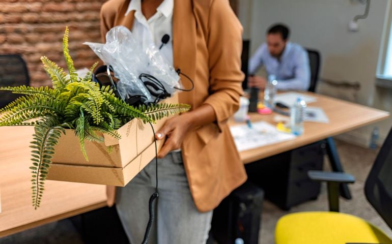 Downsize business. One female Employee moving off from office after sacked from company.