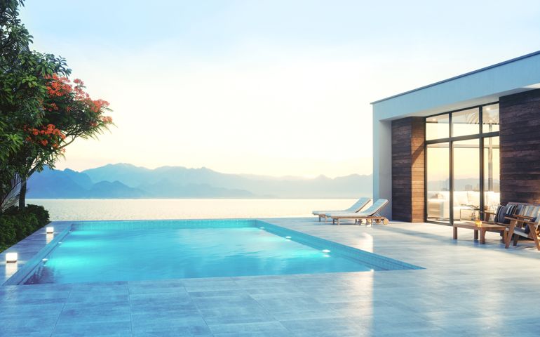 Luxury modern minimalist house with swimming pool and beautiful sea view.