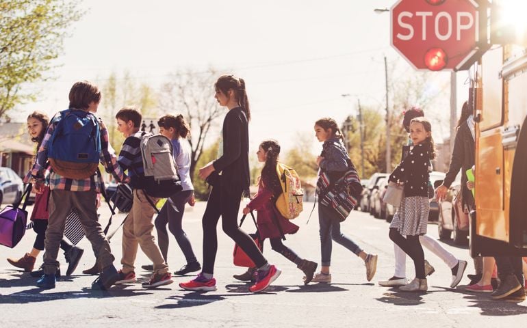 School kids crossing street