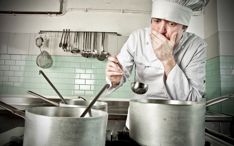 Young chef tasting soup, something went wrong!