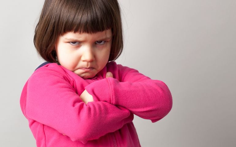 unhappy girl expressing disagreement with body language