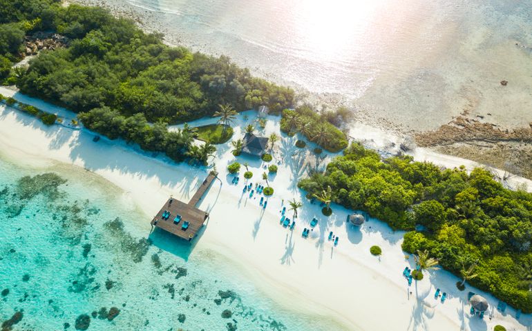 Aerial view made with drone of Canareef Resort Maldives, Addu City, Herathera island, Addu atoll (former Seenu Atoll), Maldives. Luxury travel holidays background. Property released.