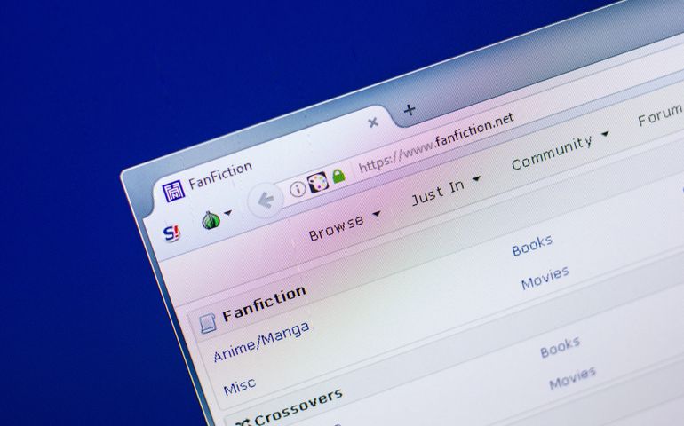 Homepage of Fanfiction website on the display of PC, url - Fanfiction.net