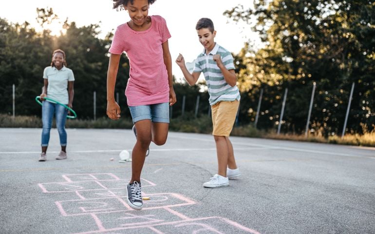 Children playing hopscotch