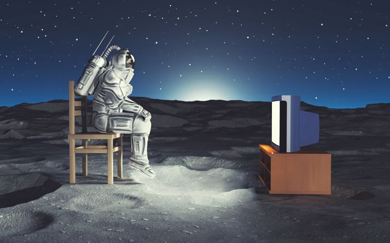 Astronaut watching tv on the moon . Online movie stream concept . This is a 3d render illustration.