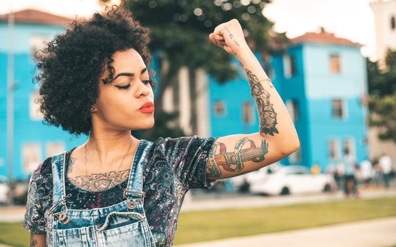 woman showing her arm muscles