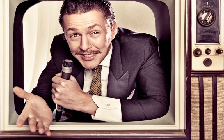 Host coming out of retro TV