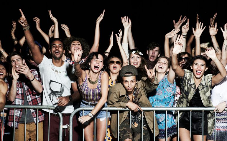 Group of people having fun at music concert