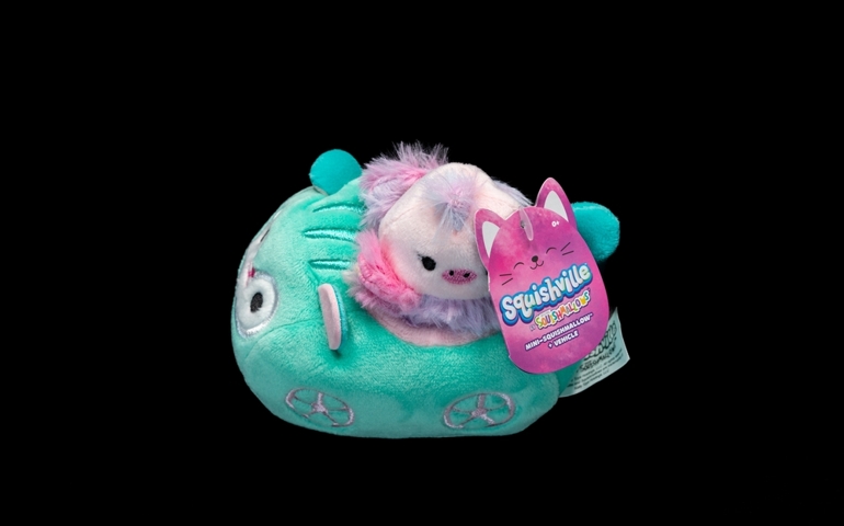 Squishmallows branded Squishville soft toy consisting of a mini-squishmallow and vehicle made of child safe materials and green pink and white in colour